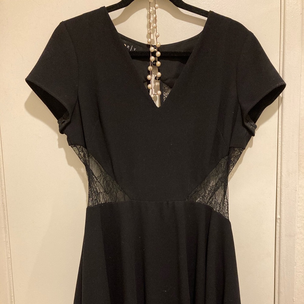 Corley sensual, sensational little black dress!